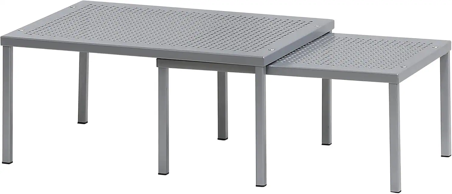 Stackable metal tables for space-saving small kitchen storage.
