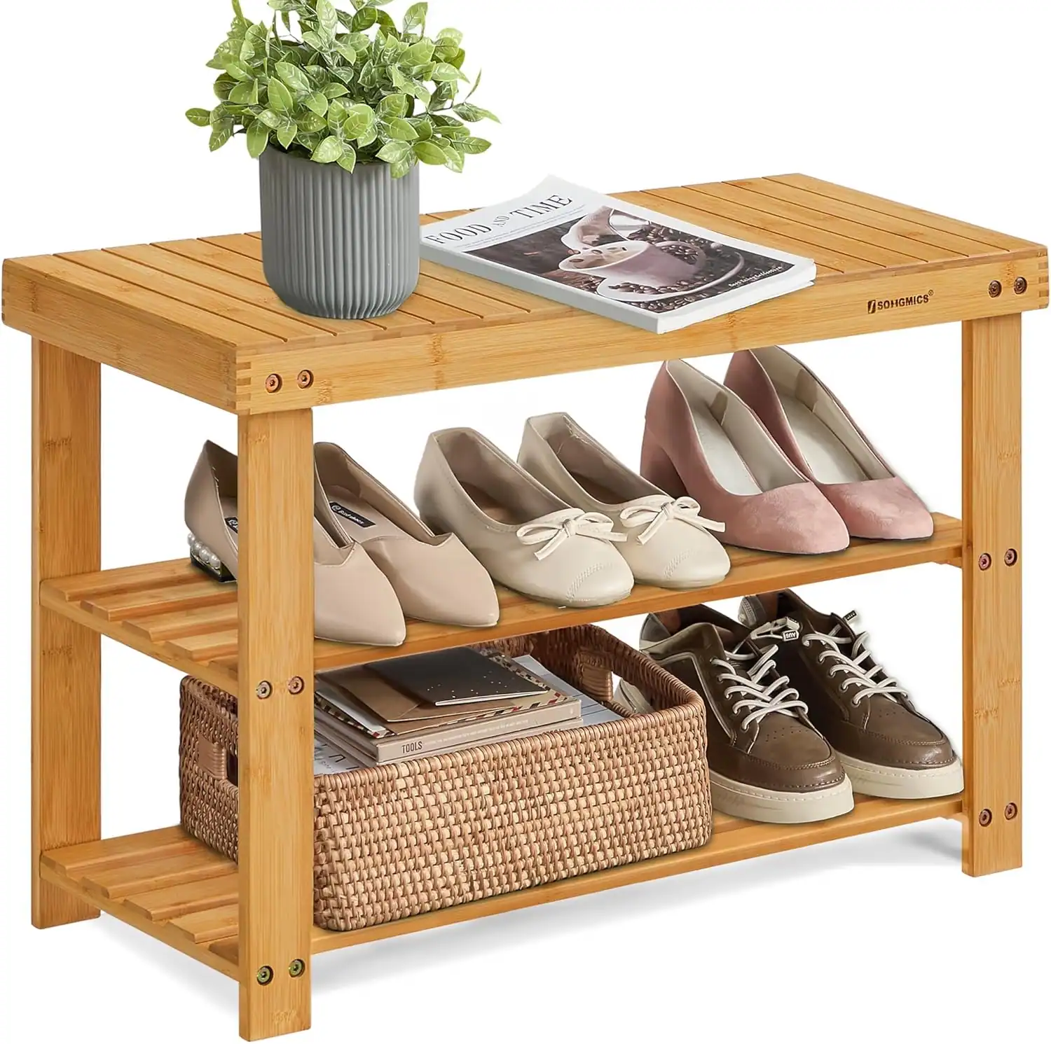 Wooden shoe rack with shoes, plant, and magazines for entryway storage.