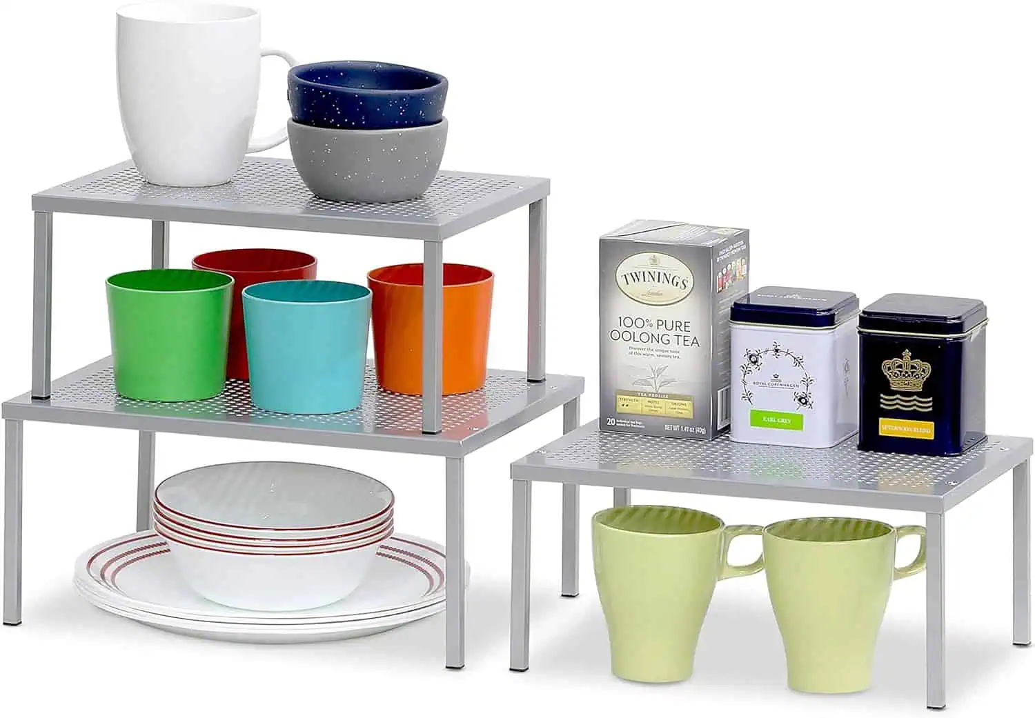 Vibrant cups, bowls, and tea tins organized for small apartment kitchens.