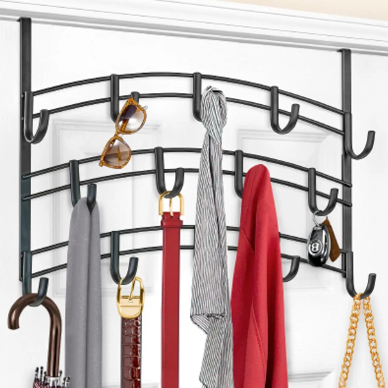 Efficient small apartment entryway with hooks for coats, bags, and accessories.