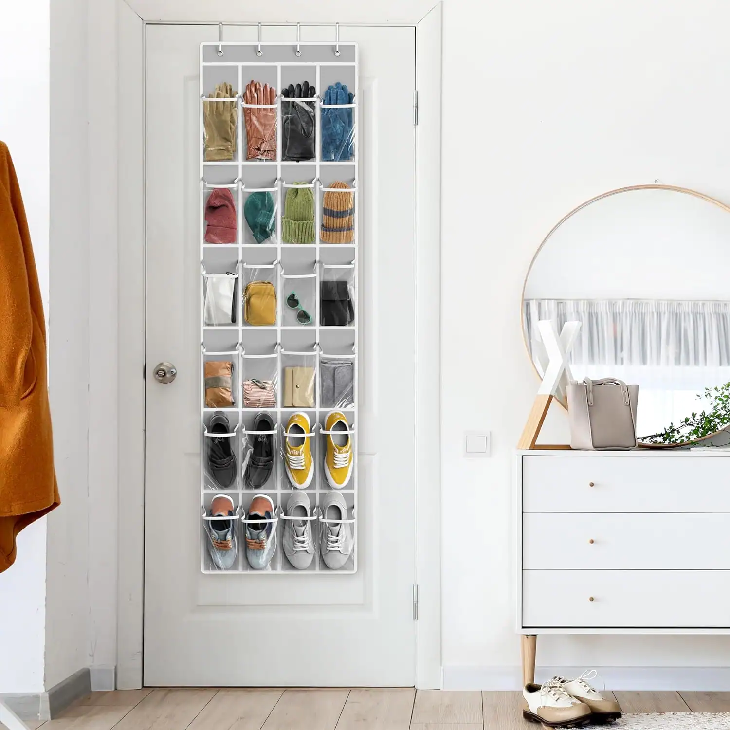 over-door organizer storing accessories in a small apartment entryway
