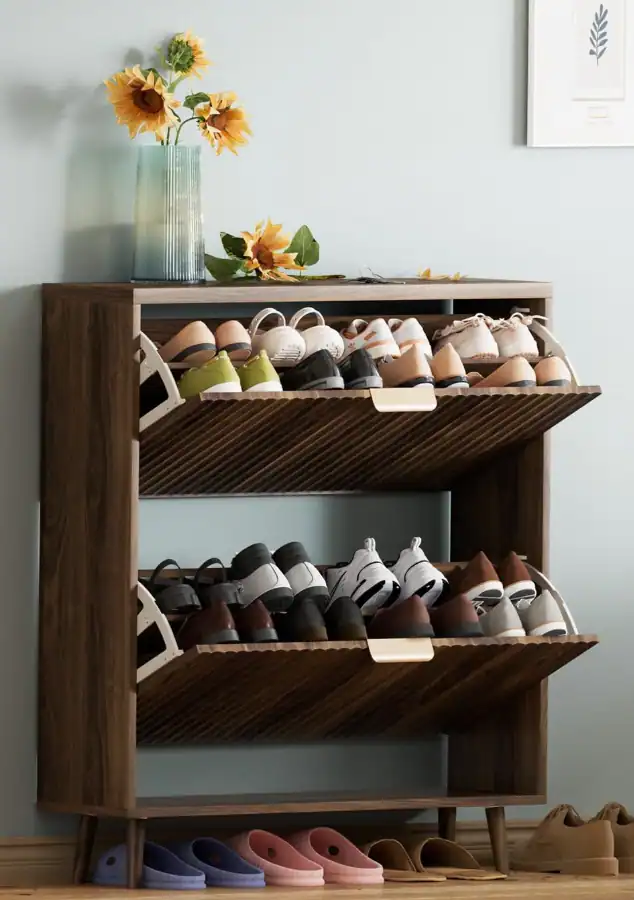 Efficient shoe storage solution for small apartment entryways.