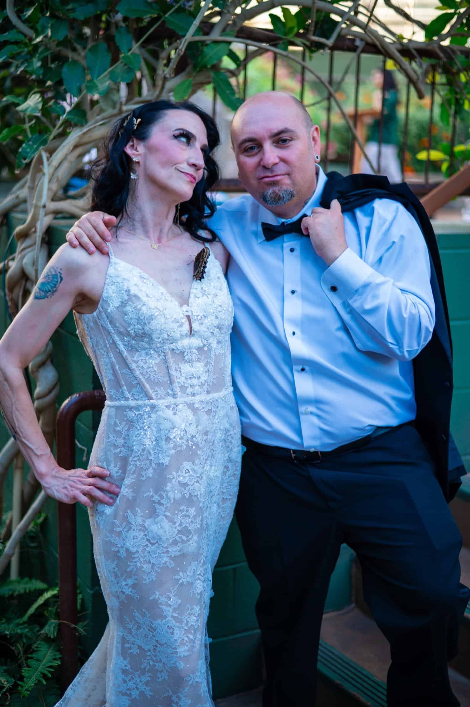 Beautiful bride and groom posing outdoors, capturing a special moment.