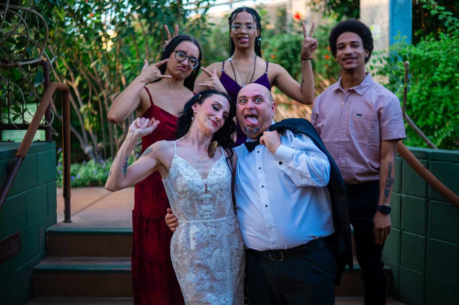 A diverse group of friends enjoying a lively outdoor gathering, showcasing happiness and camaraderie.