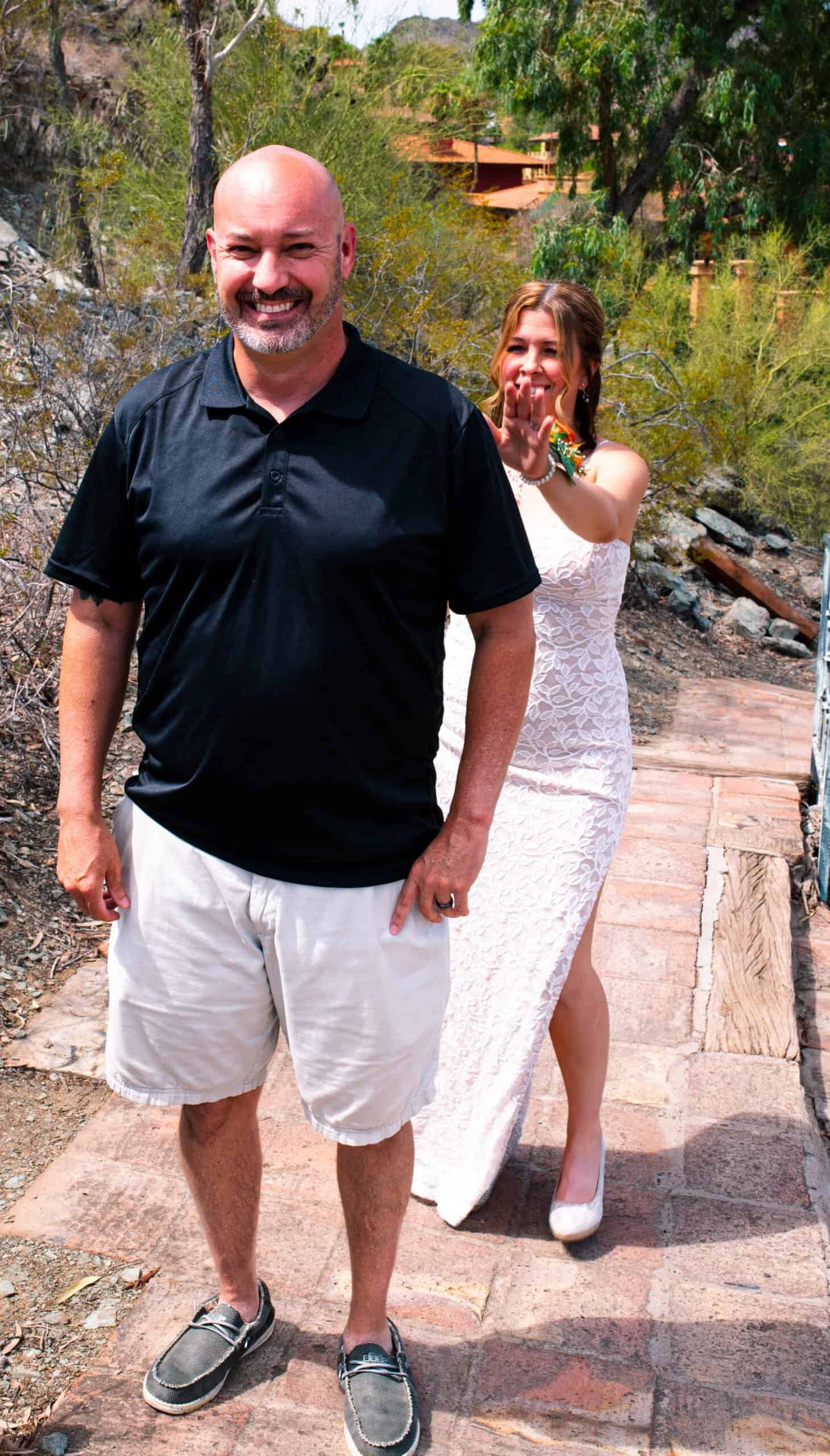 A joyful couple enjoying a walk in nature, capturing a special moment together in a beautiful outdoor setting.