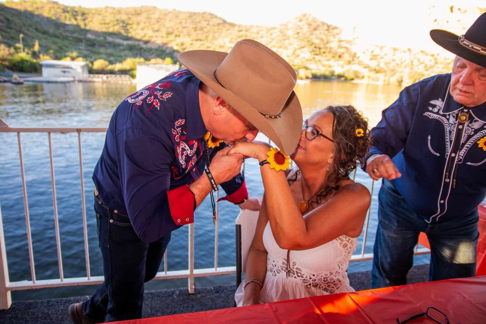 A heartfelt moment captured during a special celebration by the water, highlighting love and friendship.
