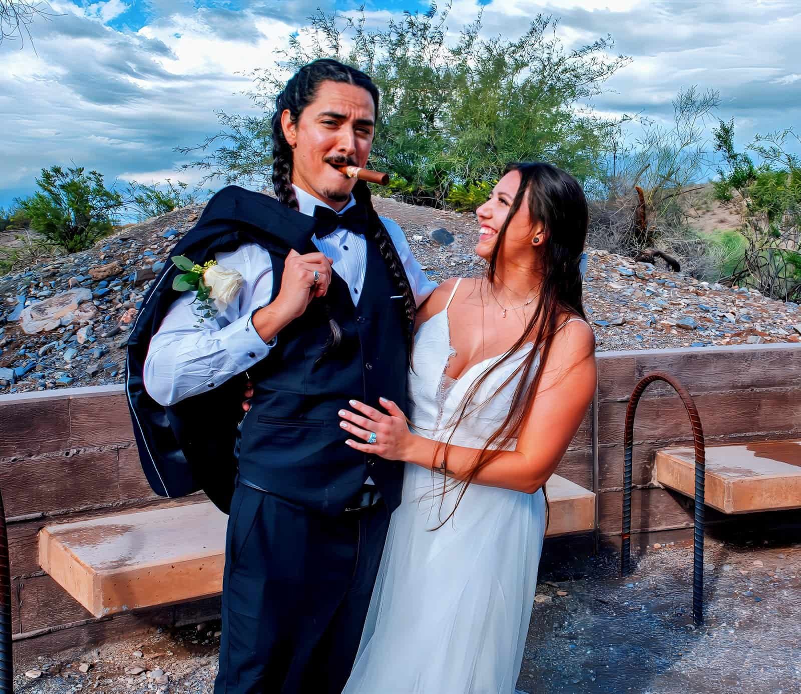 A joyful bride and groom sharing a special moment outdoors, highlighting love, celebration, and happiness on their wedding day.