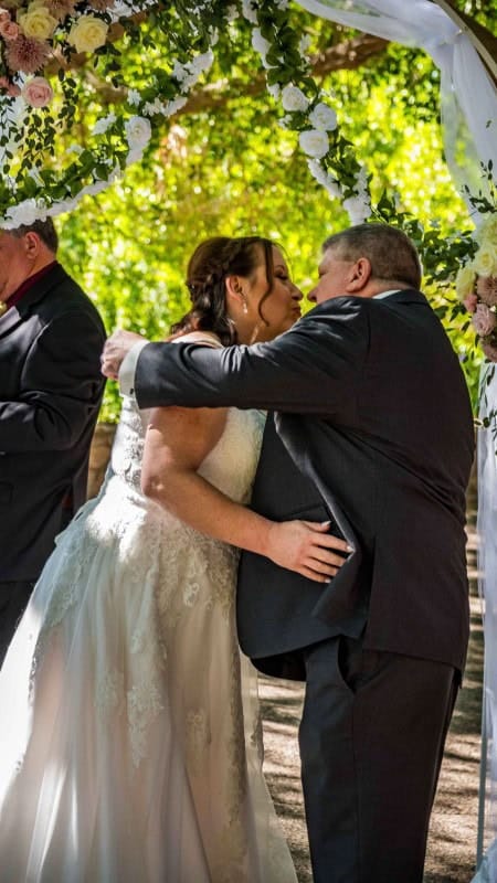 Wedding Ceremony Under Floral Arch