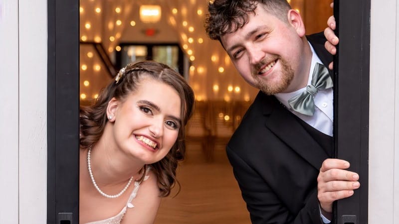Joyful Couple at Wedding Reception