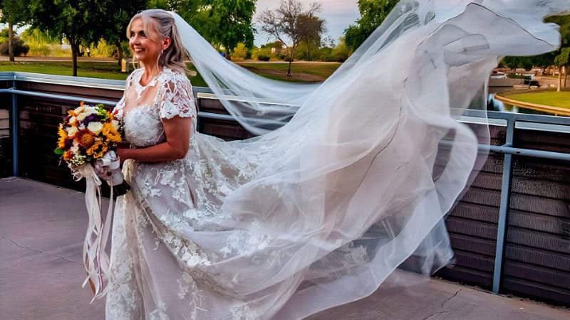 Joyful Bride with Flowing Veil
