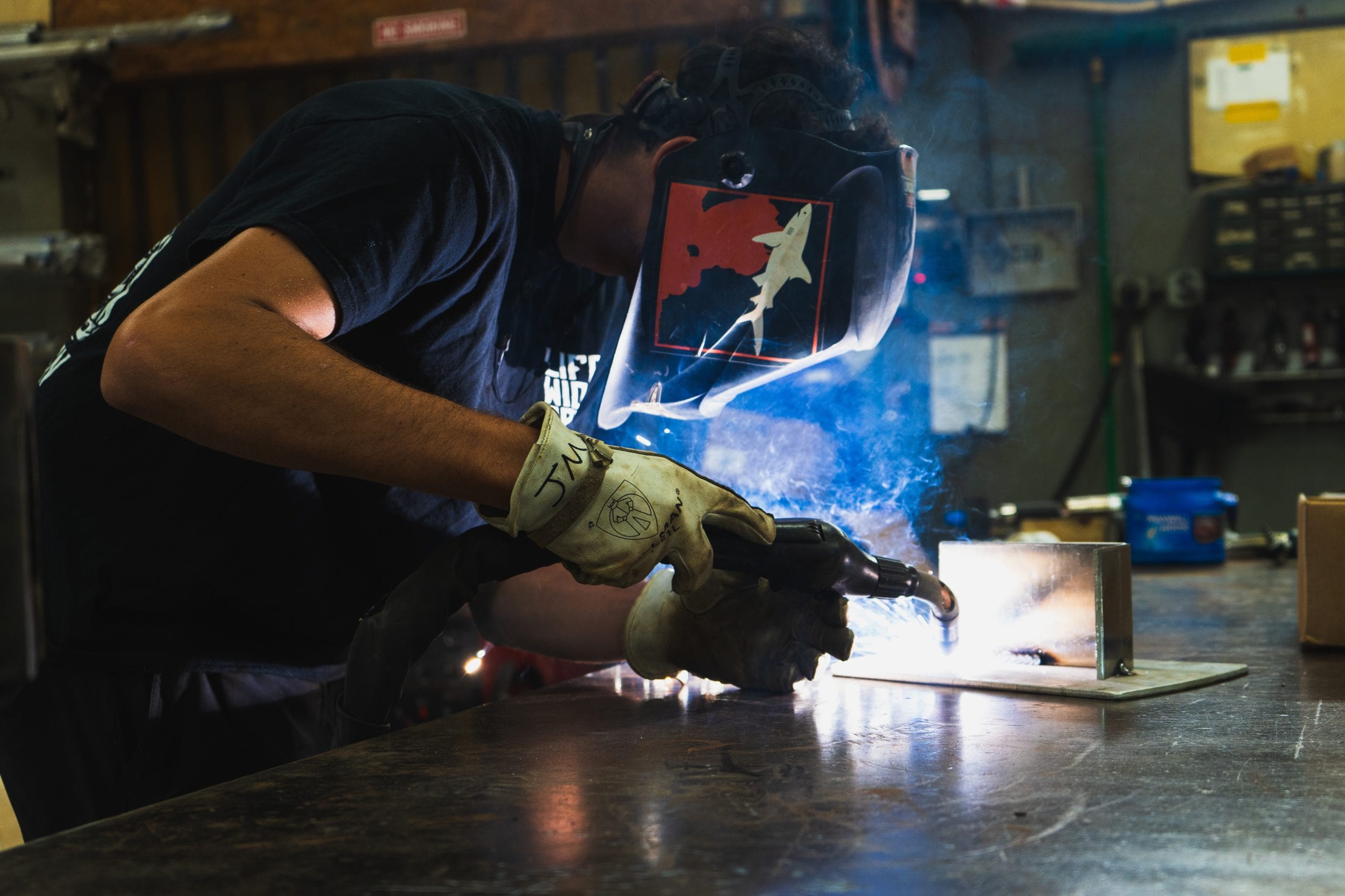 Marine welding technician fabricating metal at Spencer Marine