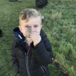 Small boy with leaf