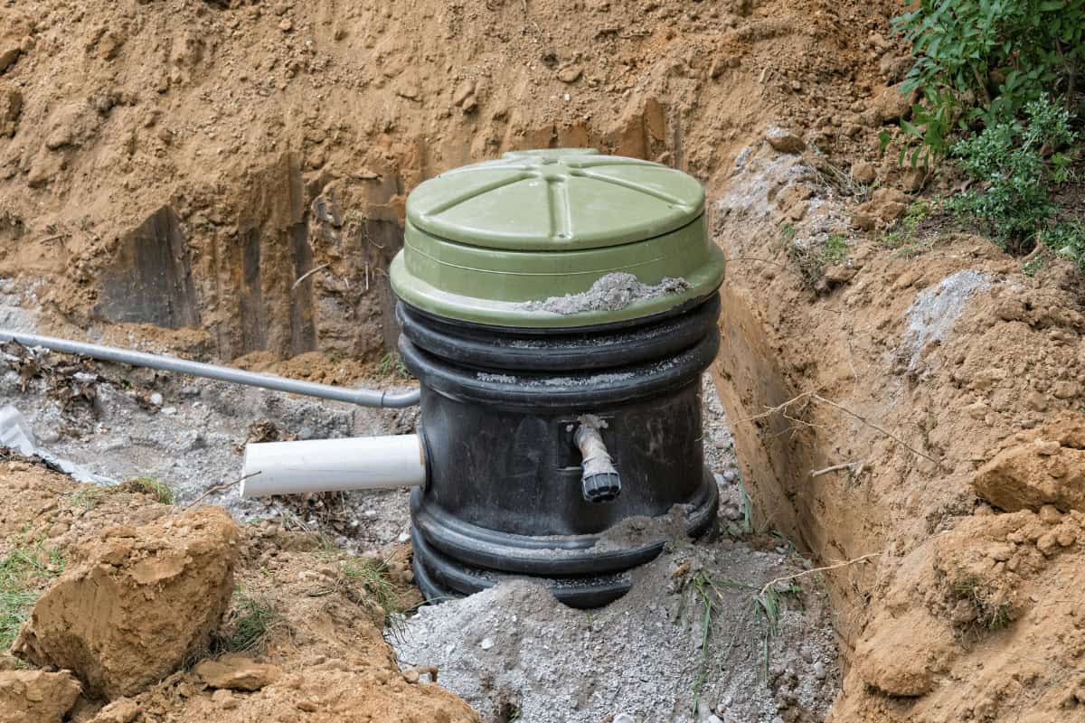 Prodigy Sewer and Drain shows a septic tank riser setup, ready for easy access and proper function in a yard.
