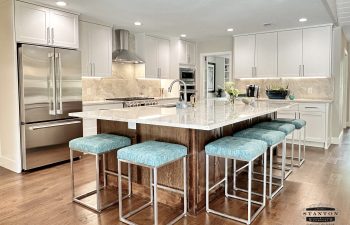Newly renovated kitchen featuring stainless appliances of an Overton Park house located in Fort Worth, TX - A Whole House transformation by Stanton & Company