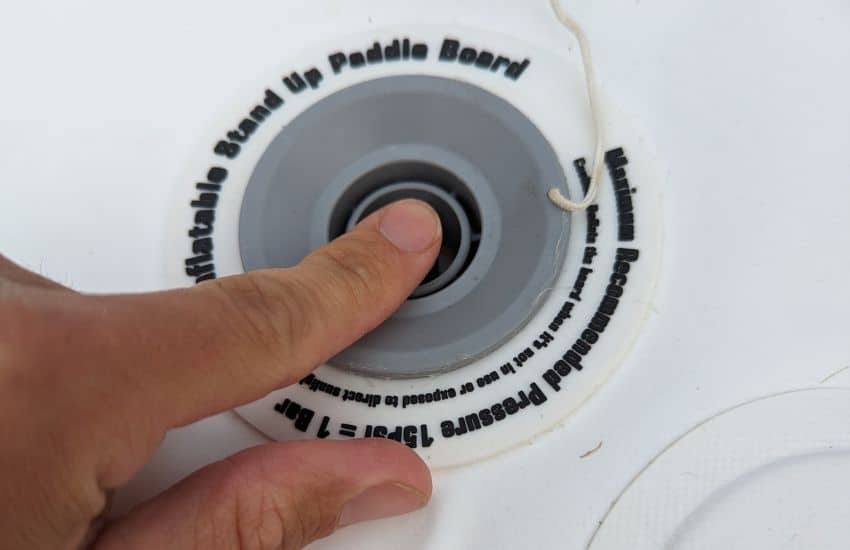 How to Inflate and Deflate Your Paddle Board (Step-by-Step Guide) 3 Release air from SUP valve