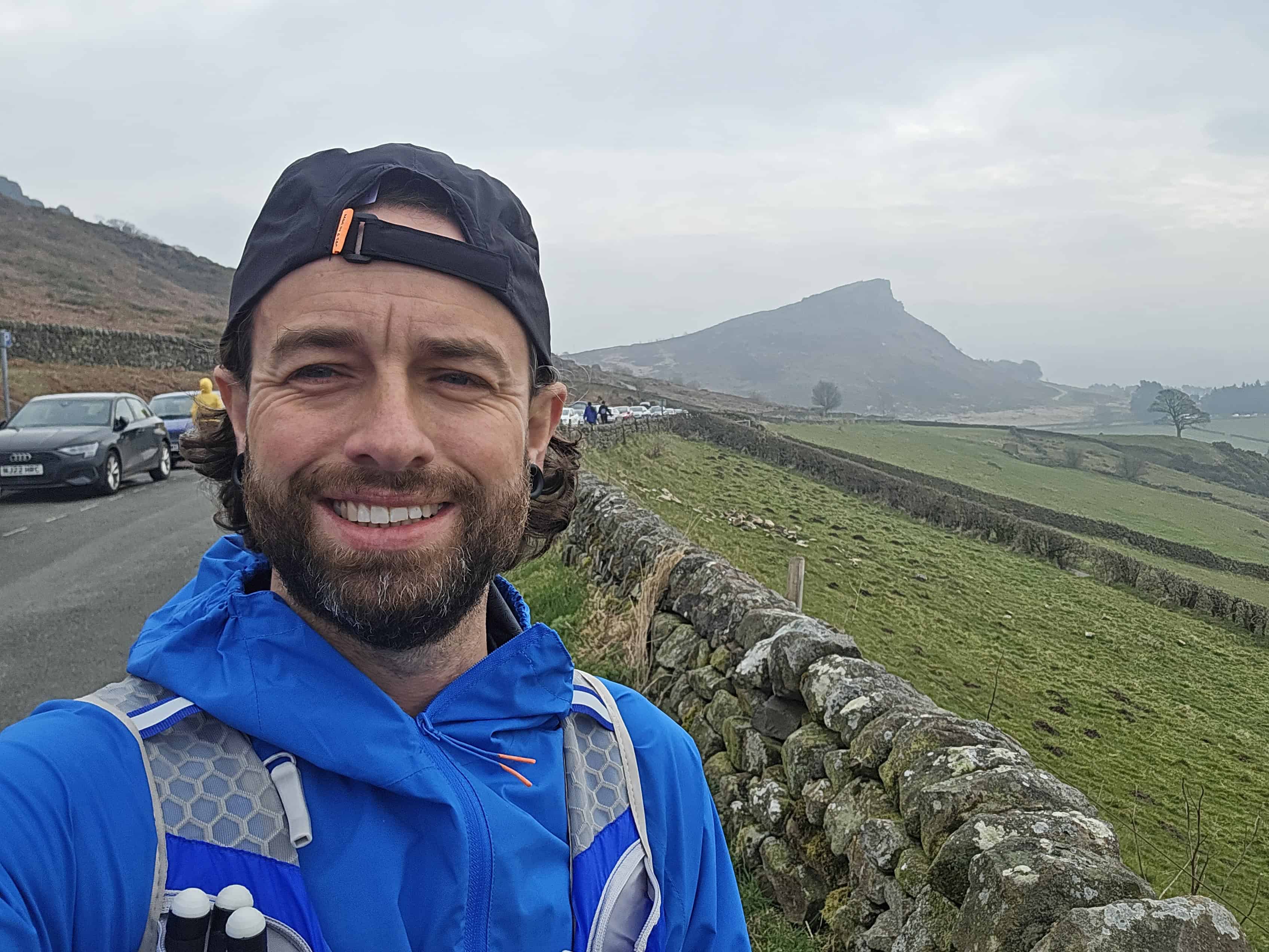 Mac in a Sac Ultralite Running Jacket – Trail Tested Review (2025) 2 Ultralite Jacket with Hen Cloud in the background