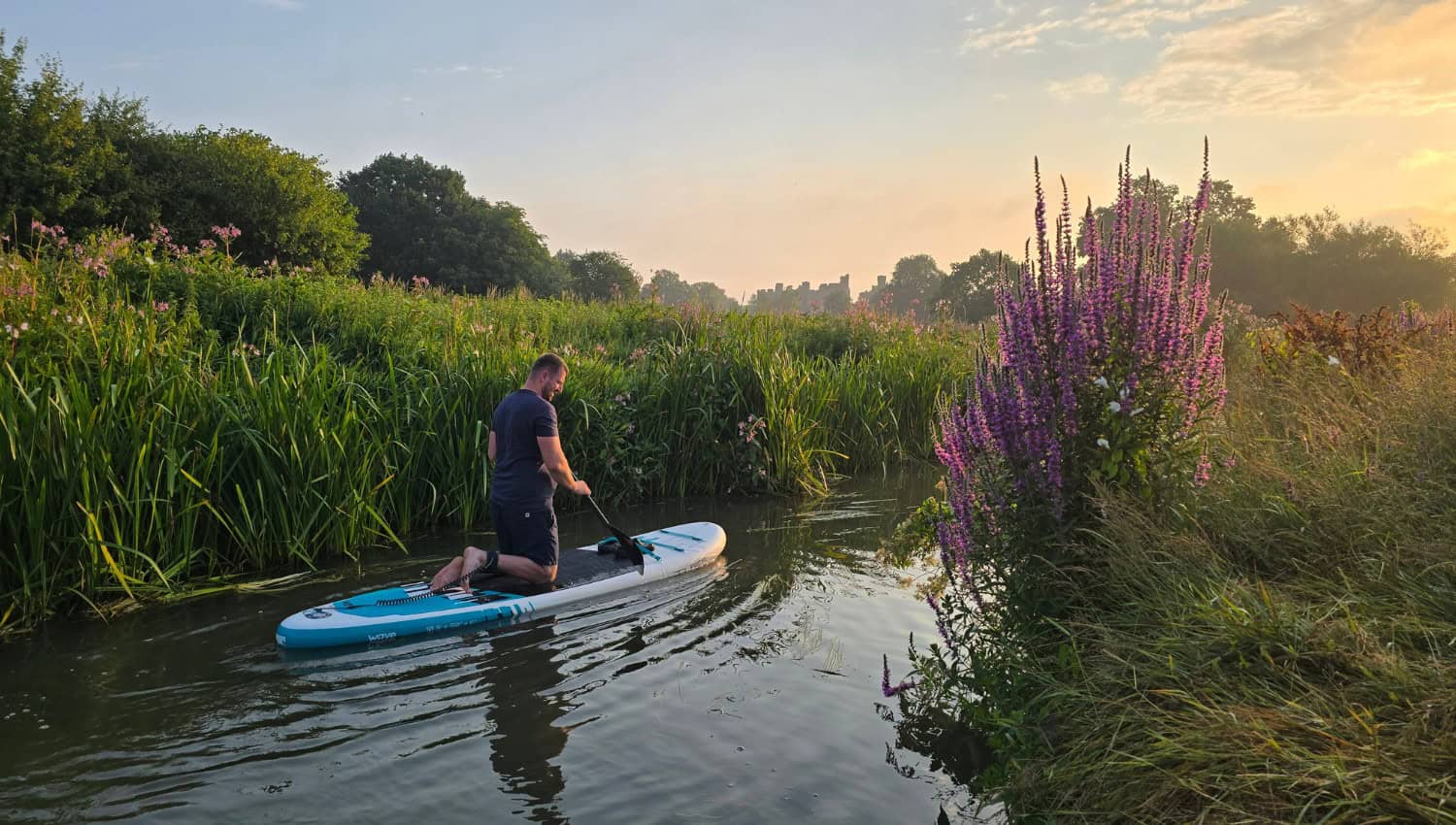 stevecleverdon.com homepage hero Sunrise paddleboared on the Wave Tourer 2.0 along the Rother River