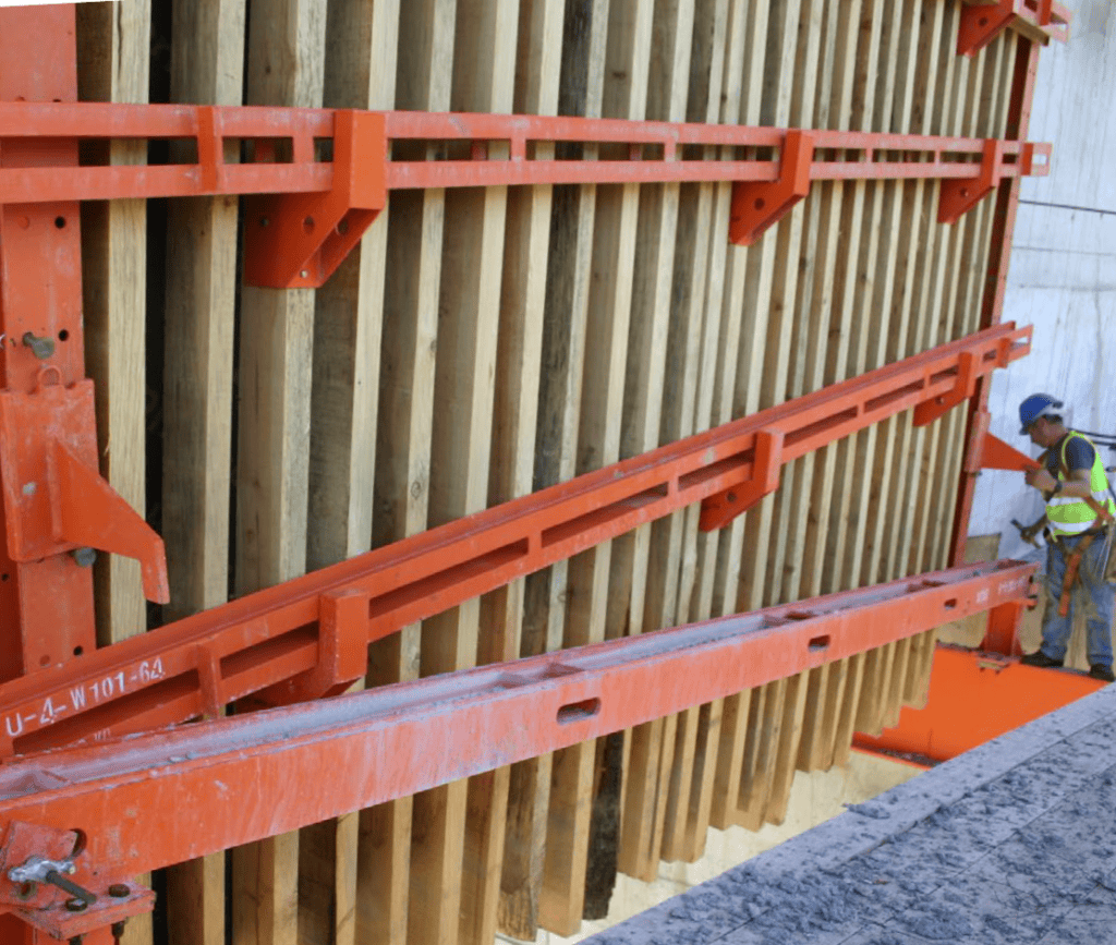 External formwork– vertical saw wooden beams and horizontal steel beams acting as strong backs