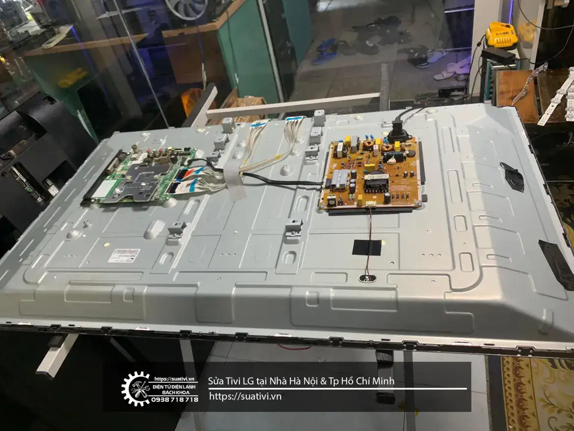 High-quality LG refrigerator circuit board during repair or maintenance, showcasing internal electronic components and wiring for efficient cooling system performance.