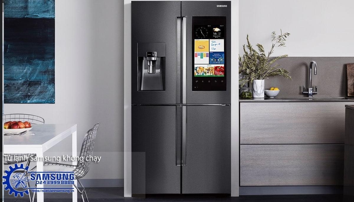 Modern Samsung Side By Side refrigerator with digital display and water dispenser in a contemporary kitchen environment.