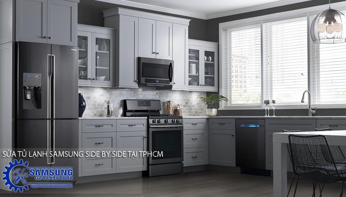 Modern gray kitchen featuring Samsung side-by-side refrigerator, oven, microwave, and dishwasher, showcasing sleek kitchen appliances and cabinetry. Perfect for home appliance repairs and upgrades.