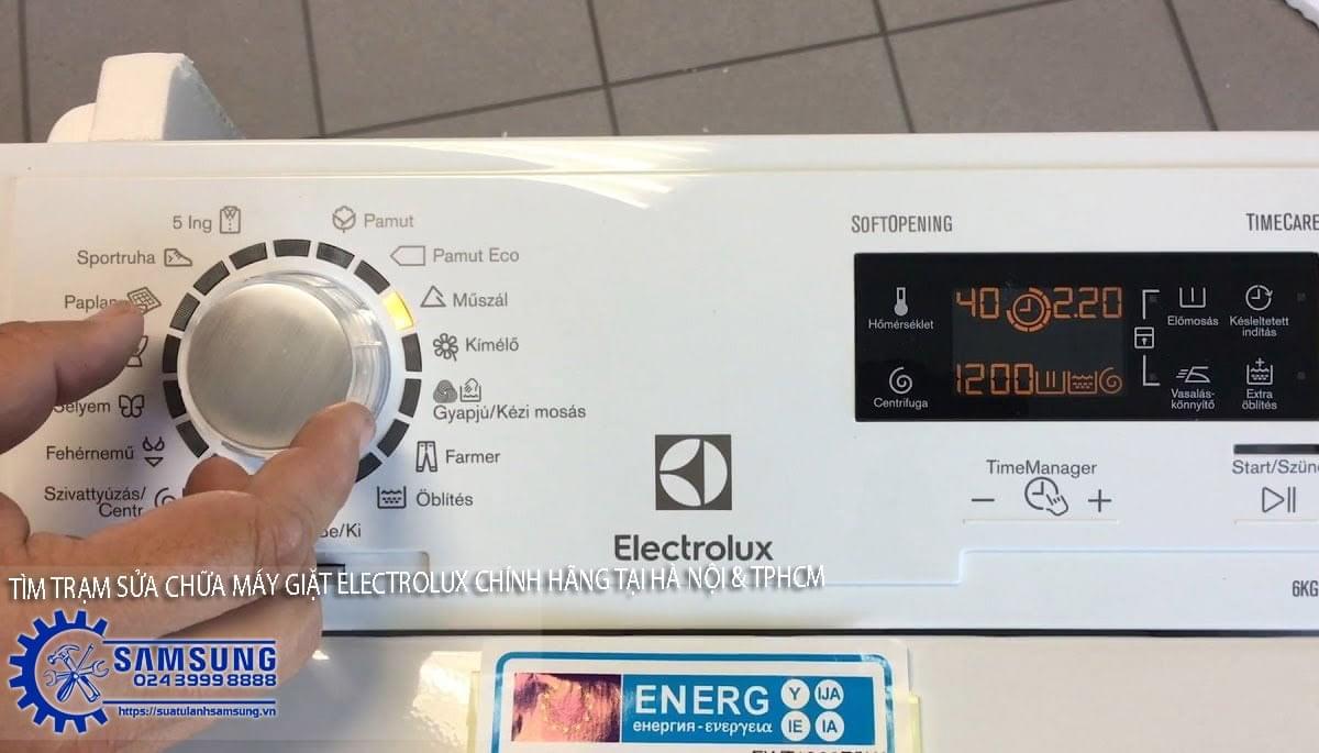 Smooth operation panel of Electrolux washing machine with digital display and various cycle options, including delicate, heavy-duty, and quick wash, great for appliance repair services.