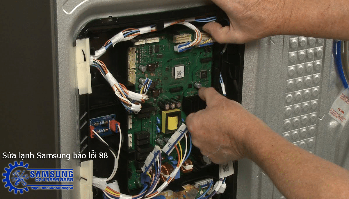 Circuit board inside Samsung side-by-side refrigerator for repair or maintenance, showing electronic components and wiring, related to Samsung refrigerator repair services.