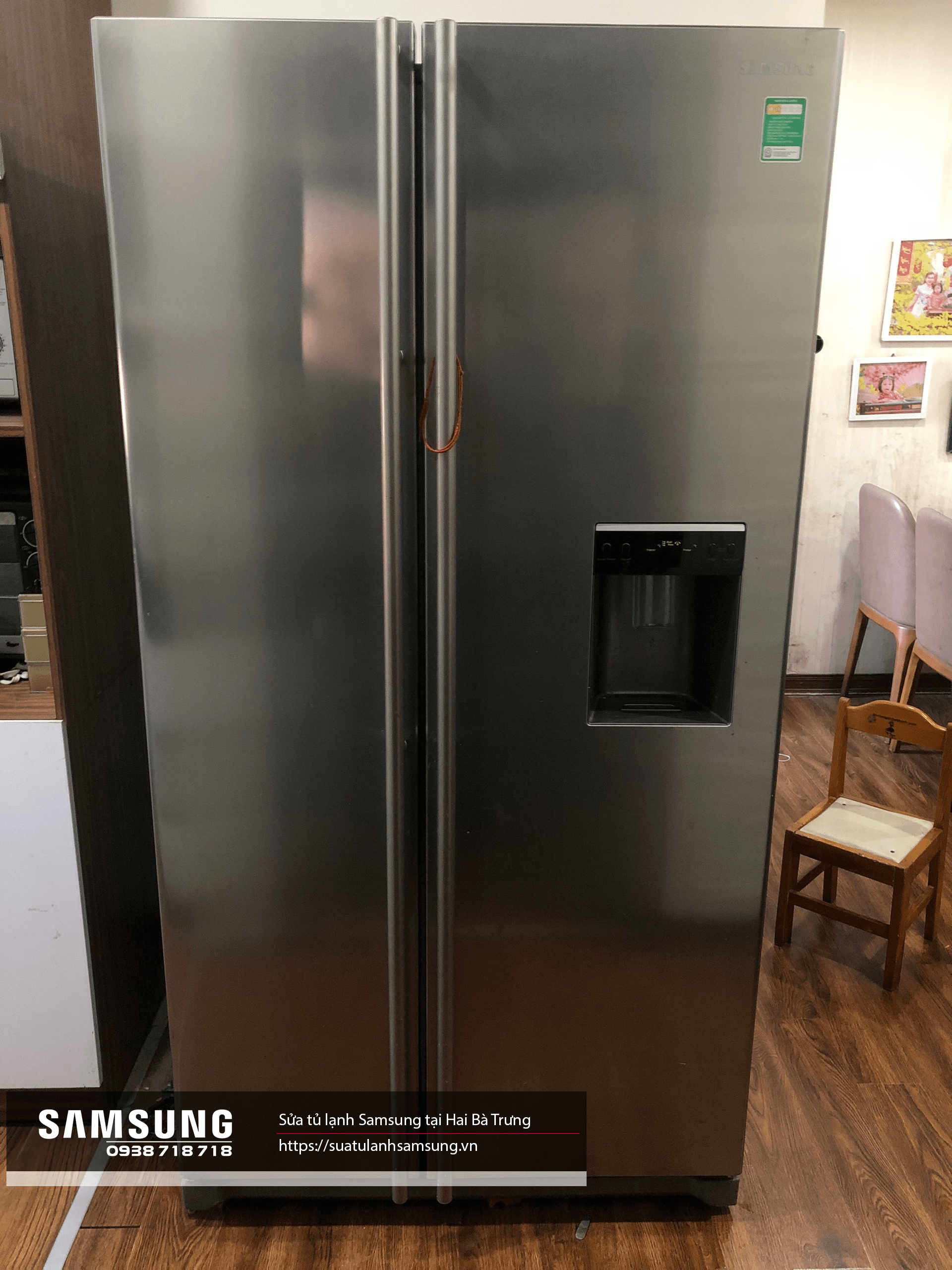 Stainless steel Samsung side-by-side refrigerator with water and ice dispenser, repair service available, located in Hai Bà Trưng, suitable for home and commercial use.