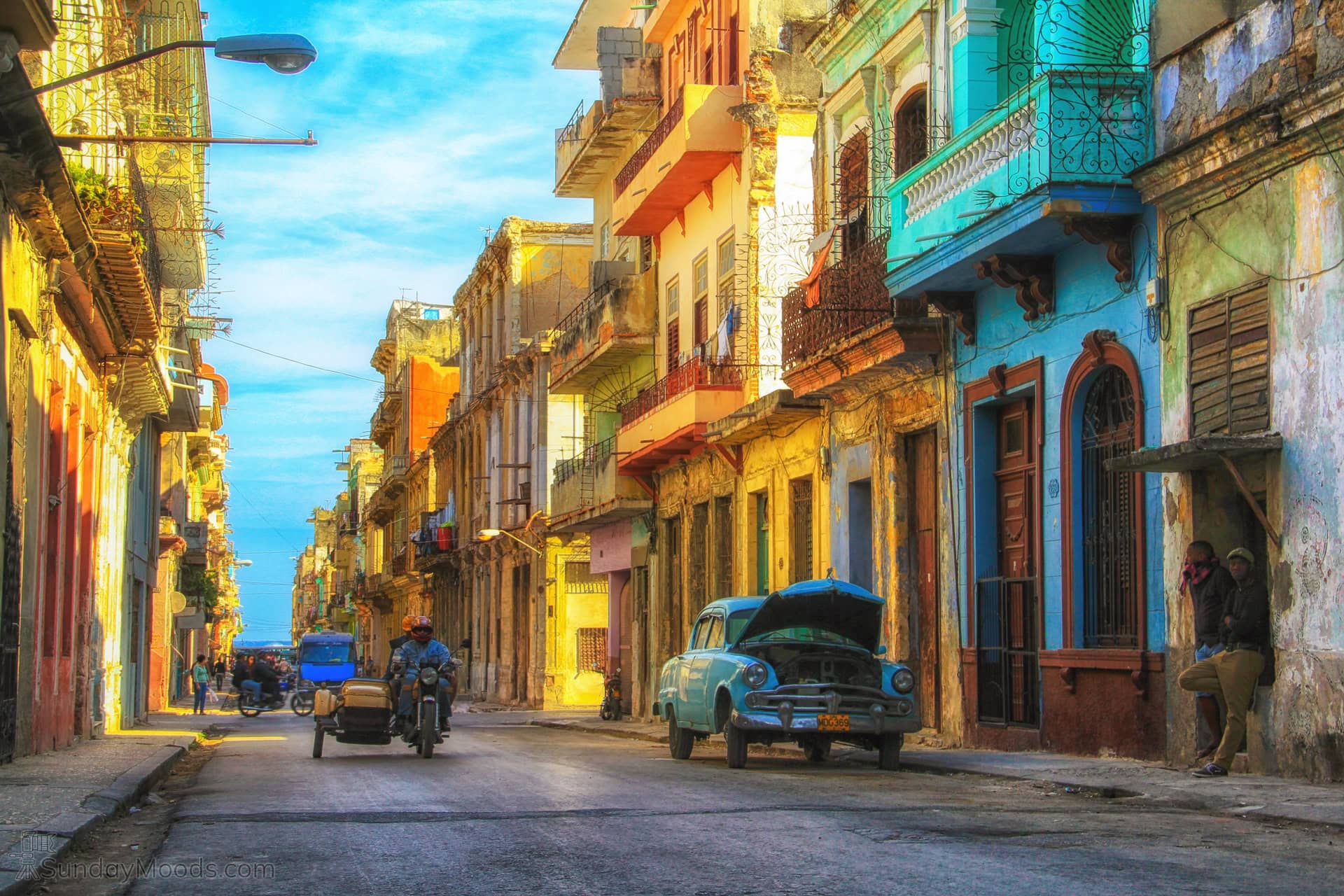 Cuban street with overflowing view of the ocean (Exhibit Edition)