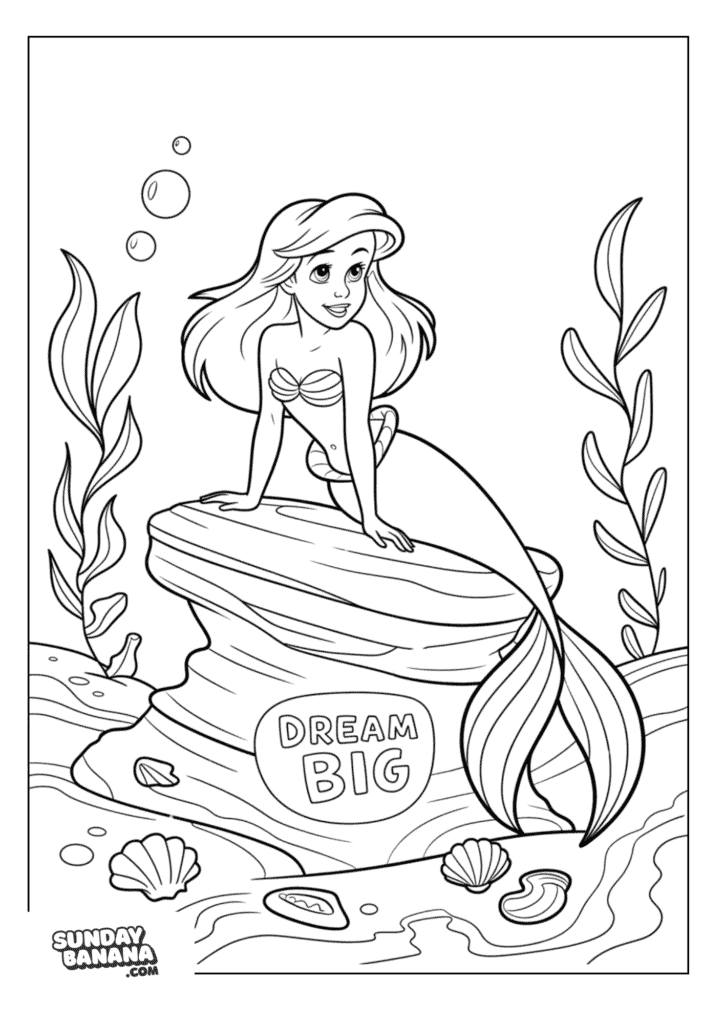Princess Ariel from Little Mermaid sitting pretty on a rock under water with the words 'Dream Big'. Around her are seaweed and seashells Disney Coloring Page