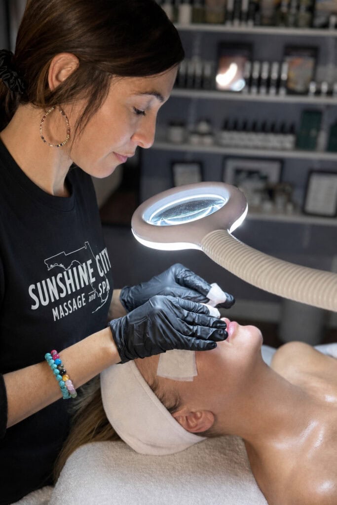 michelle licensed esthetician performing golden hour anti aging facial for mature skin at sunshine city massage and spa