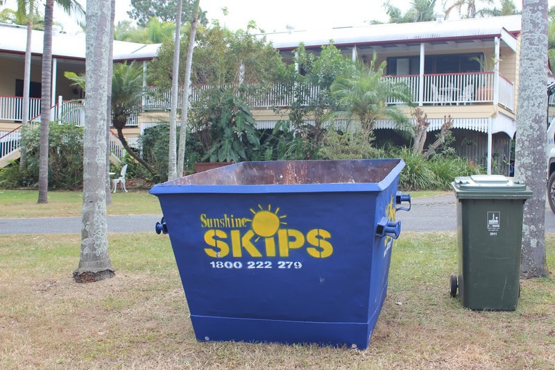 Blue 3m³ skip bin for waste disposal at Sunshine Skips.
