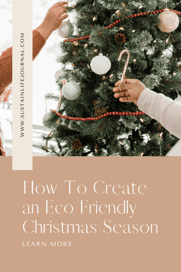 two people decorating a sustainable christmas tree