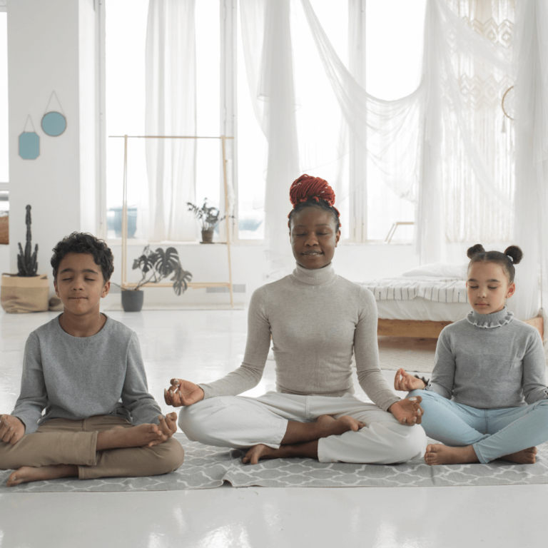 a black family meditating as self care