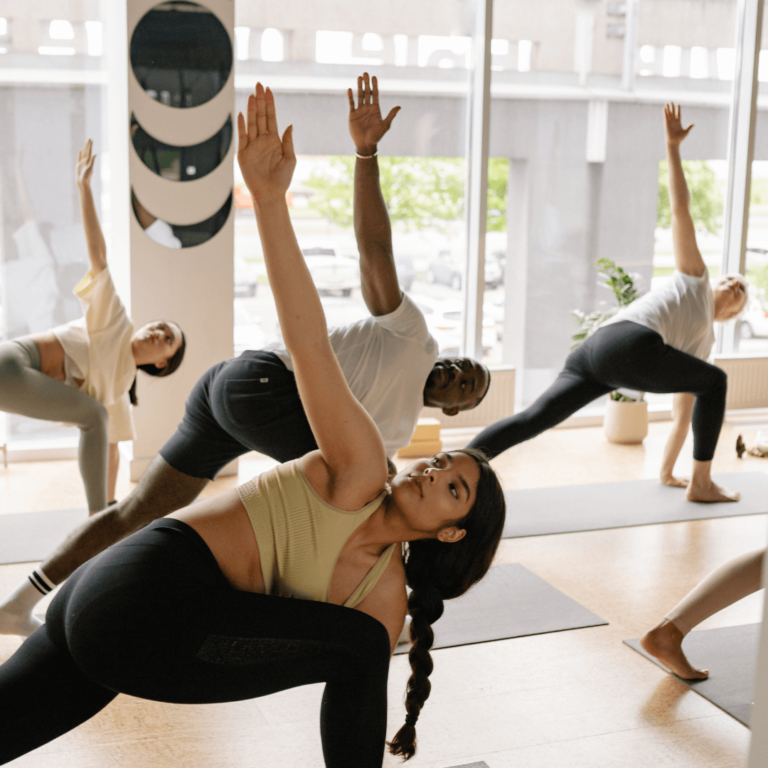 A class of yoga students at a yoga studio