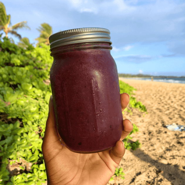 a berry juice in a mason jar