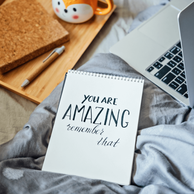 a positive affirmation with a journal