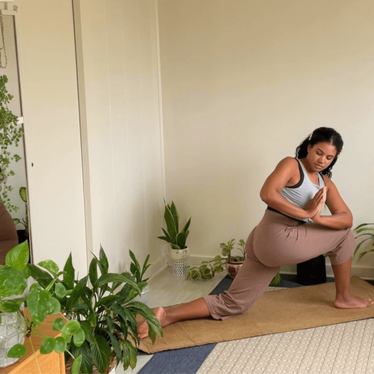 a woman doing her first yoga sequence for beginners