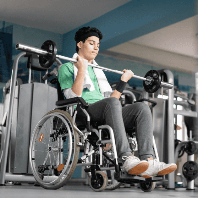 a teen boy in a wheel chair working out at the gym as a healthy habit for a teen