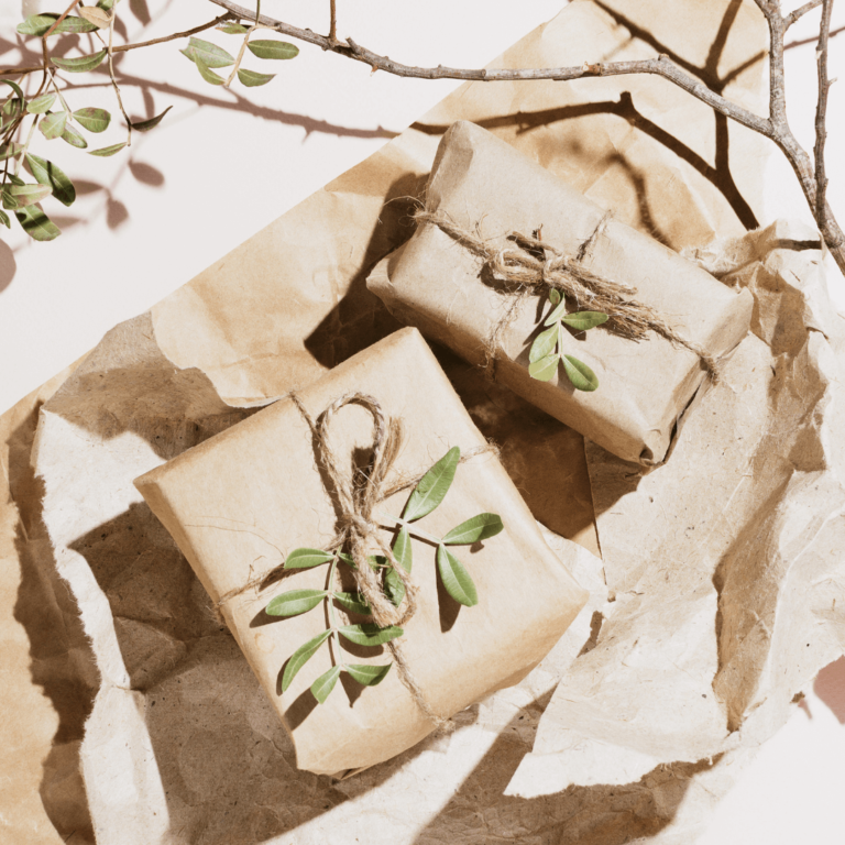 christmas wrapping paper made from recycled paper, twine and leaves