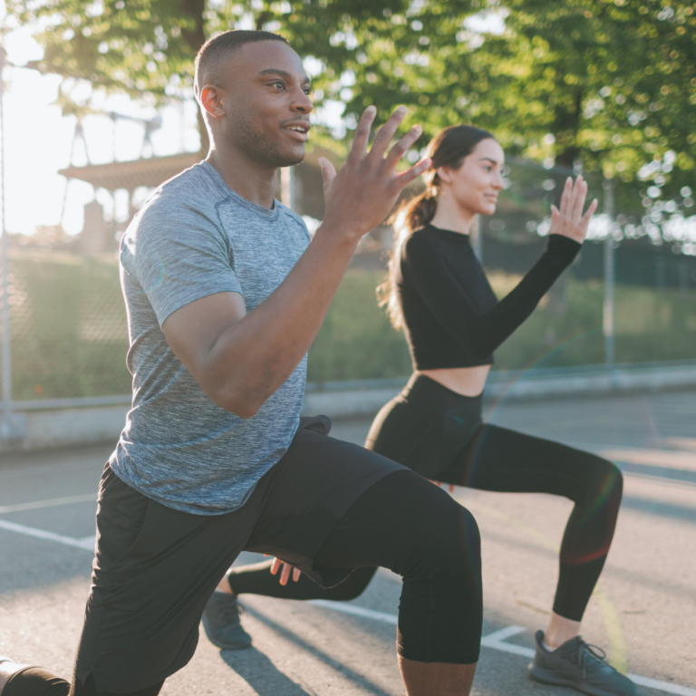 a couple doing an outdoor workout