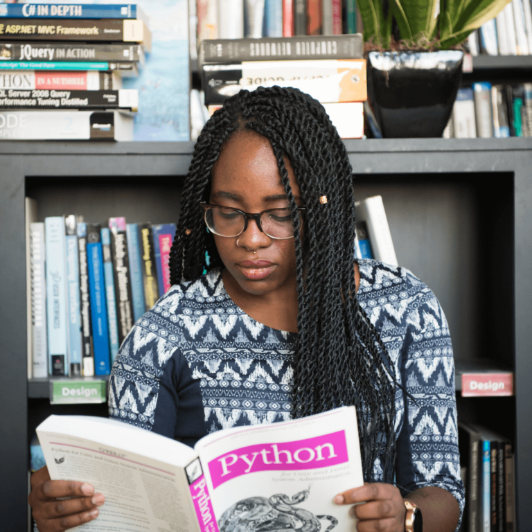 a woman reading a book as part of the 75 hard challenge