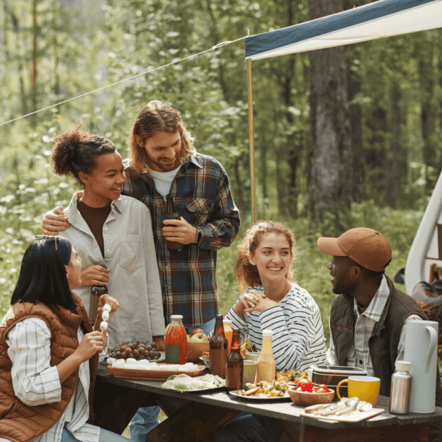 a group of friends enjoying their organized camp set up