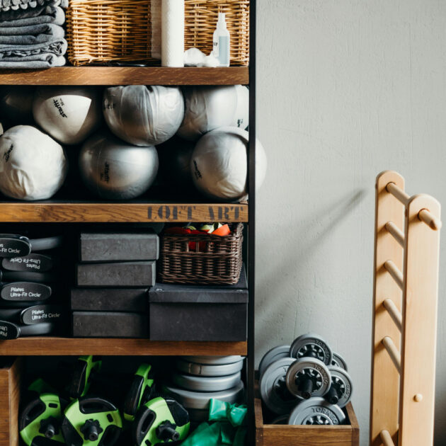 small gym at home with weights and pilates equipment