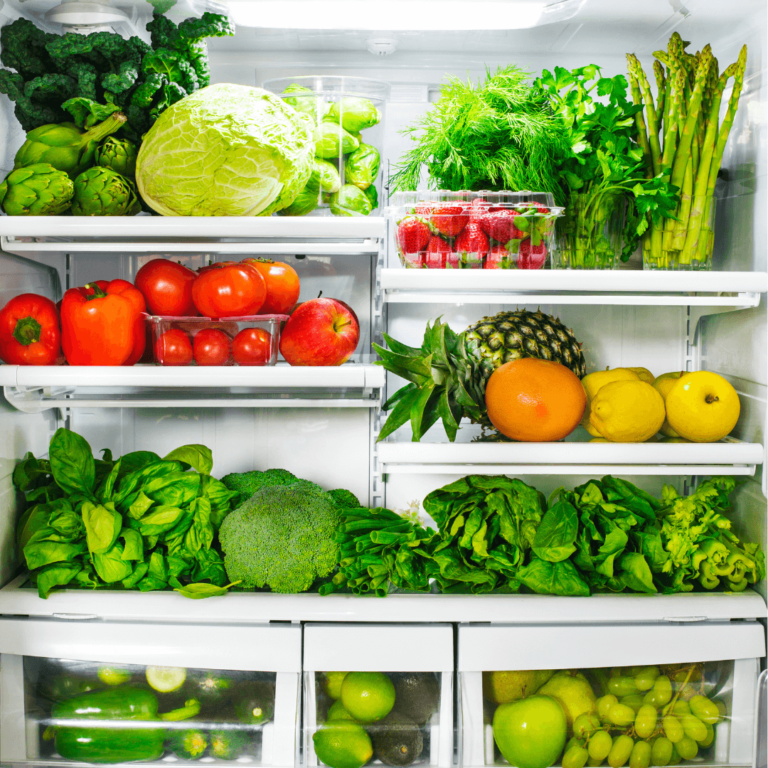 a freshly cleaned fridge with fresh produce