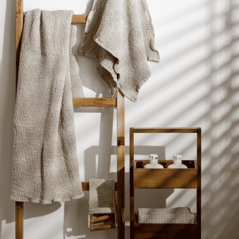 Clean towel on a ladder in a tiny bathroom
