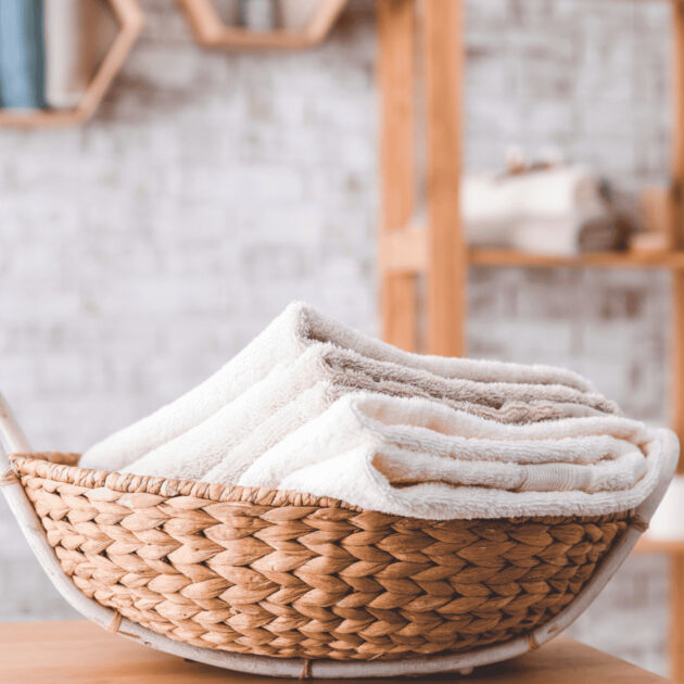 white hand towels in a basket for compact spaces