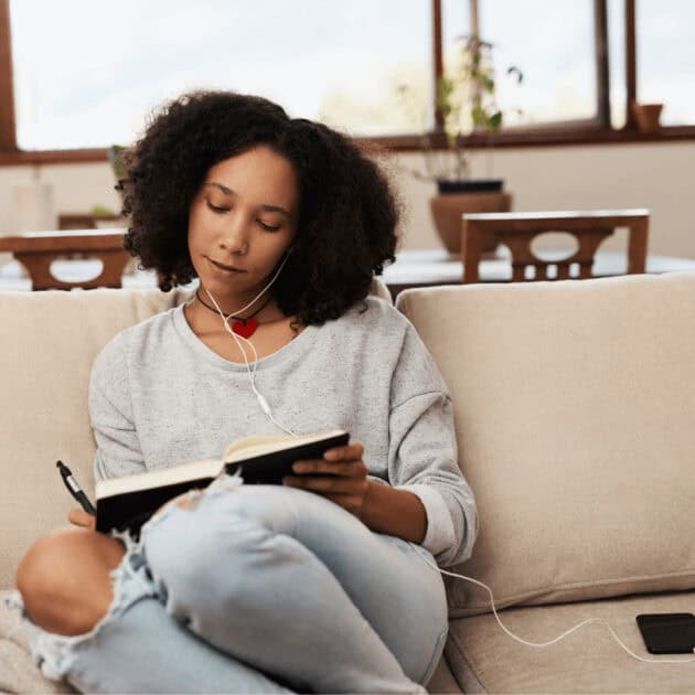 a woman journaling for relaxation