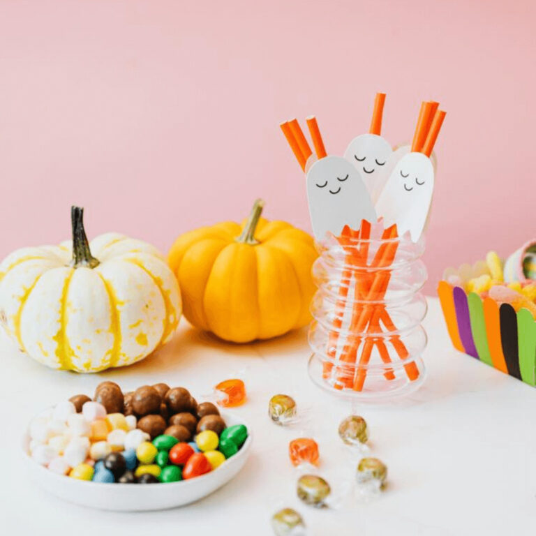 a snack table at a Halloween party serving vegan treats