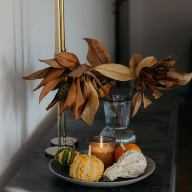 fall centerpiece with gold candle sticks